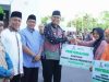 Bupati Sumbawa Serahkan 2,1 Miliar Kepada Guru, UMKM dan Marbot Masjid